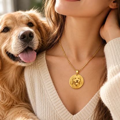 Woman wearing a gold personalized pet portrait necklace with a golden retriever beside her